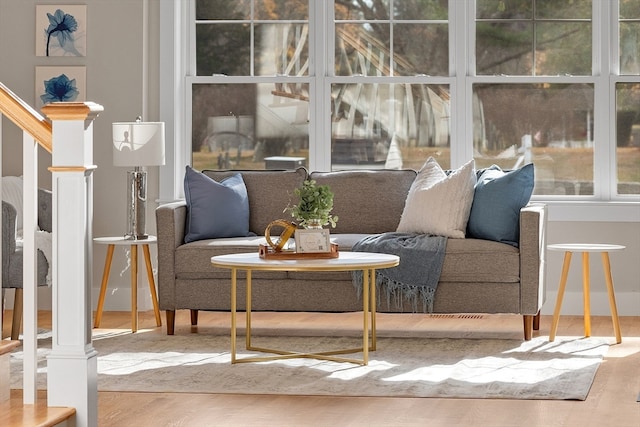 sitting room featuring wood-type flooring