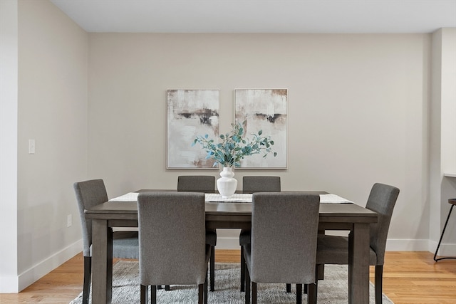 dining area featuring hardwood / wood-style floors