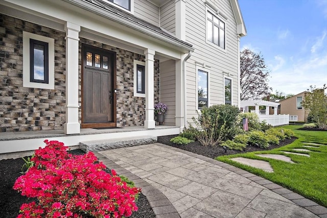 entrance to property with covered porch