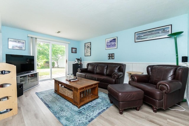 24 Coventry Rd Unit 24, Grafton, MA 01519 - living room with light wood finished floors and a wainscoted wall