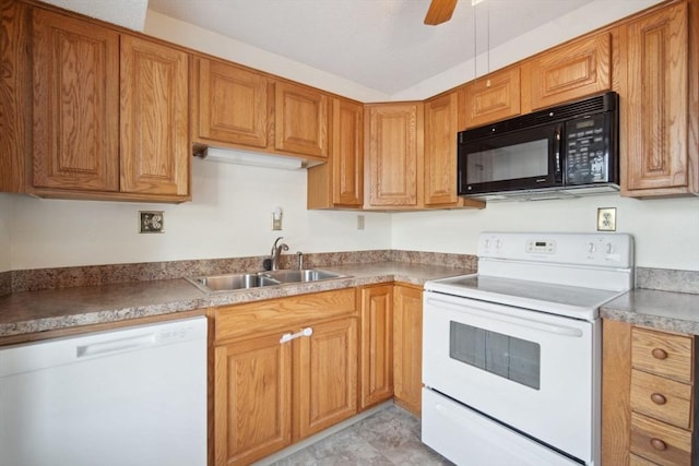 kitchen featuring ceiling fan, white appliances, and sink