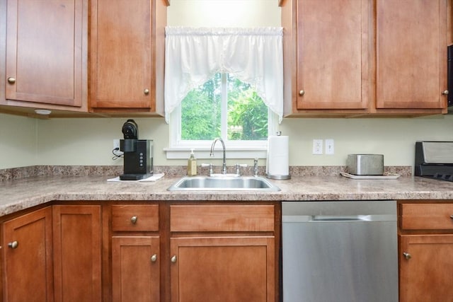 503 Dongary Rd Unit 503, Easton, MA 02375 - kitchen featuring dishwasher, light countertops, and brown cabinetry
