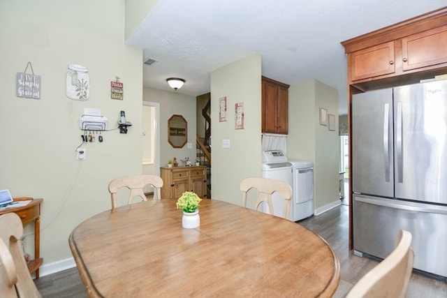 503 Dongary Rd Unit 503, Easton, MA 02375 - dining space with washer and clothes dryer, dark wood finished floors, and stairway