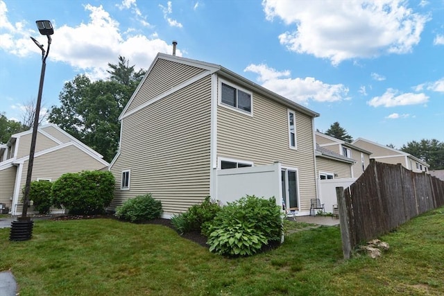 503 Dongary Rd Unit 503, Easton, MA 02375 - view of side of home featuring a patio area