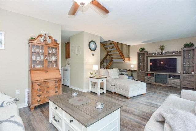 503 Dongary Rd Unit 503, Easton, MA 02375 - living room featuring stairs, washer / clothes dryer, wood finished floors, and a ceiling fan