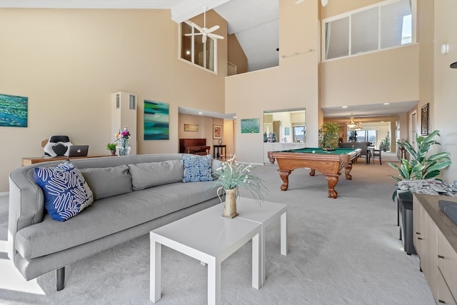 carpeted living room featuring billiards and high vaulted ceiling