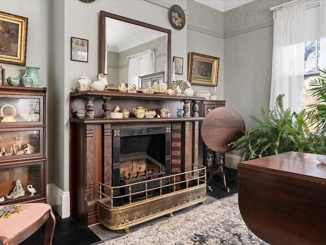 living area with ornamental molding