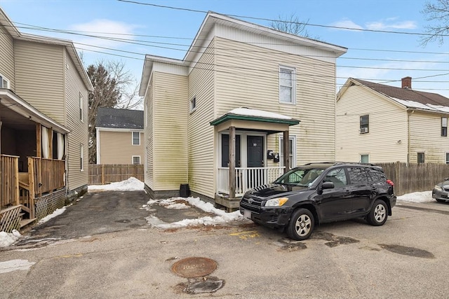 view of front of home with fence