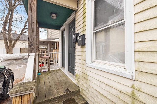 wooden deck featuring a porch