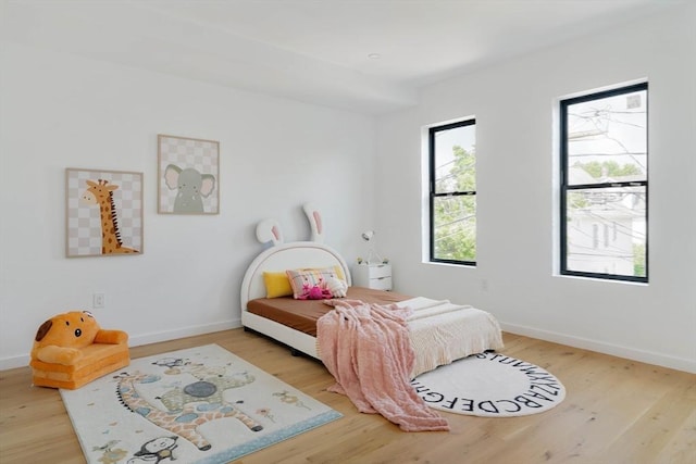 bedroom featuring light wood-type flooring