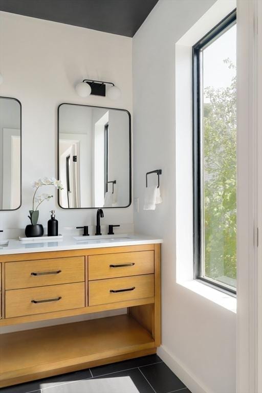 bathroom featuring vanity and tile patterned floors