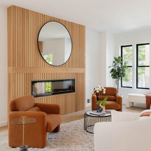 interior space with hardwood / wood-style flooring and a fireplace