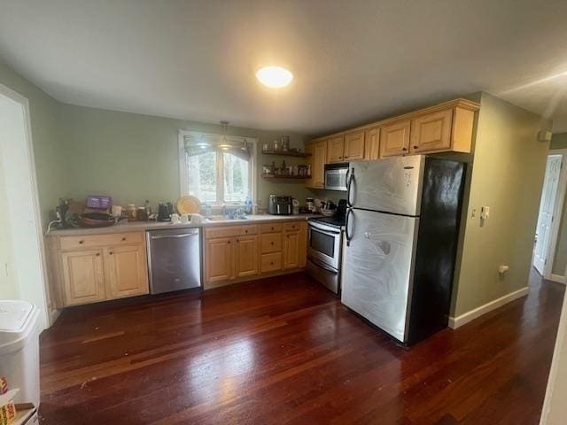 kitchen with dark wood finished floors, light brown cabinetry, appliances with stainless steel finishes, and open shelves