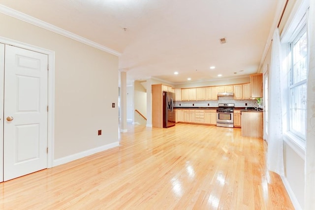 kitchen with light hardwood / wood-style flooring, light brown cabinets, sink, appliances with stainless steel finishes, and crown molding