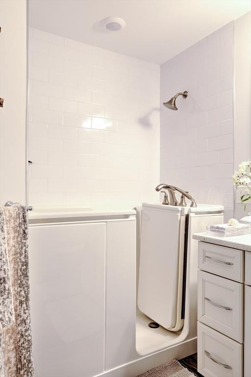 11 Cushing Pl Unit 106, Chelmsford, MA 01824 - full bathroom featuring a shower stall and vanity