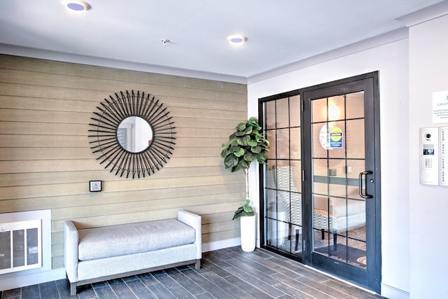 11 Cushing Pl Unit 106, Chelmsford, MA 01824 - sitting room with wood tiled floors, wood walls, and recessed lighting