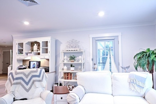 11 Cushing Pl Unit 106, Chelmsford, MA 01824 - living room featuring ornamental molding, light wood-style flooring, and recessed lighting
