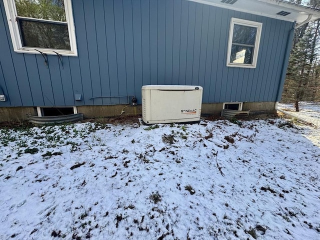 view of snow covered property