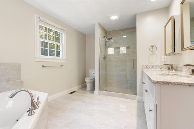 bathroom featuring a garden tub, toilet, vanity, baseboards, and a stall shower