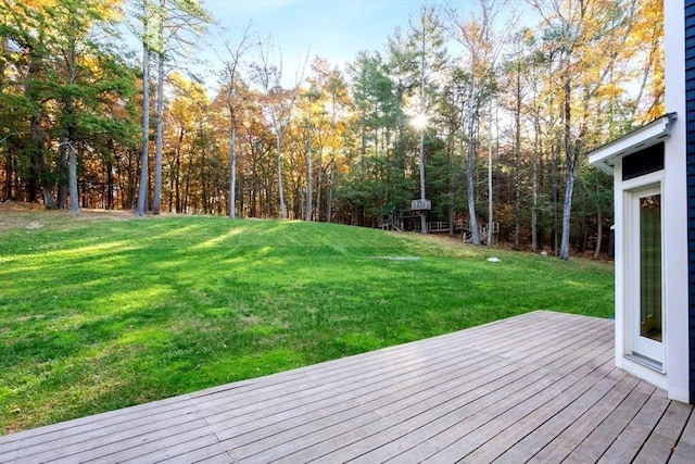 wooden deck with a yard