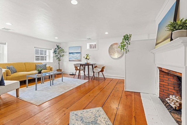 218 Washington St Unit 5, Marblehead, MA 01945 - living area featuring a fireplace, light wood-type flooring, and recessed lighting