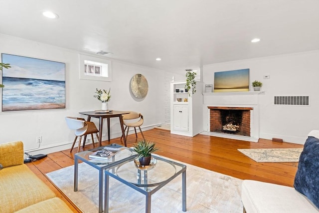 218 Washington St Unit 5, Marblehead, MA 01945 - living room with hardwood / wood-style floors, a fireplace, baseboards, and recessed lighting