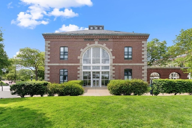 42 8th St Unit 1301, Boston, MA 02129 - back of house featuring a lawn and brick siding