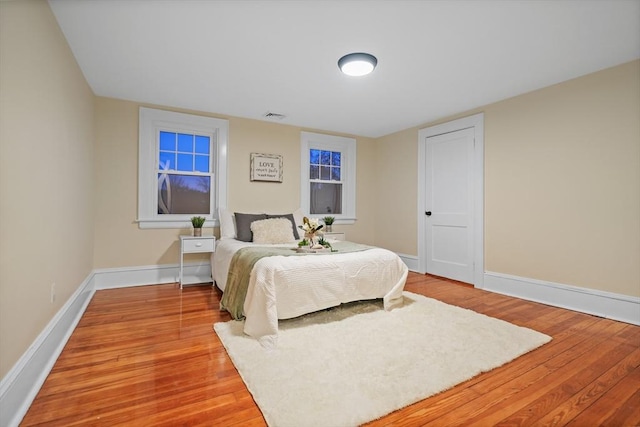 bedroom featuring wood-type flooring