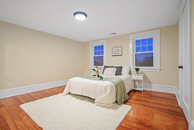 bedroom featuring wood-type flooring