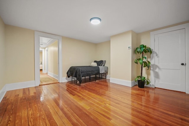 bedroom featuring hardwood / wood-style floors