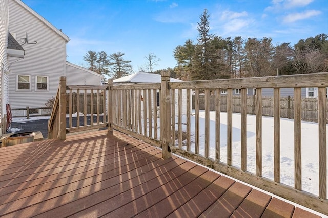 view of snow covered deck