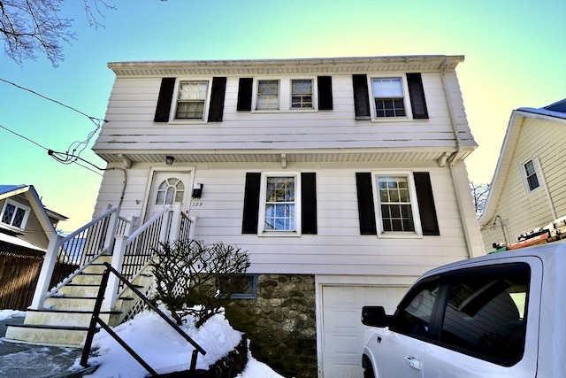 view of front of property featuring a garage