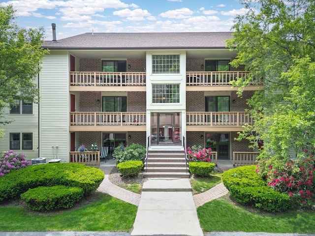 99 Apache Way Unit 99, Tewksbury, MA 01876 - view of building exterior with central air condition unit