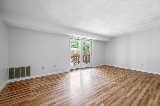 99 Apache Way Unit 99, Tewksbury, MA 01876 - spare room featuring baseboards and light wood-style flooring