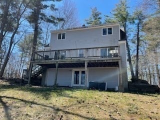 back of house featuring a deck