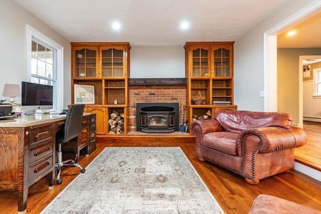 262 Homestead Ave, Rehoboth, MA 02769 - office space featuring a wood stove, wood finished floors, recessed lighting, and baseboard heating