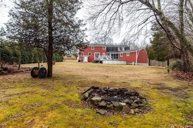 262 Homestead Ave, Rehoboth, MA 02769 - view of green lawn with a fire pit and a deck