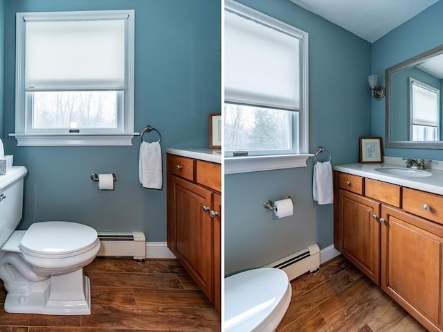 262 Homestead Ave, Rehoboth, MA 02769 - bathroom featuring a baseboard heating unit, vanity, and wood finished floors
