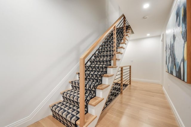 30 Concord Sq Unit 1, Boston, MA 02118 - staircase featuring baseboards, recessed lighting, and wood finished floors