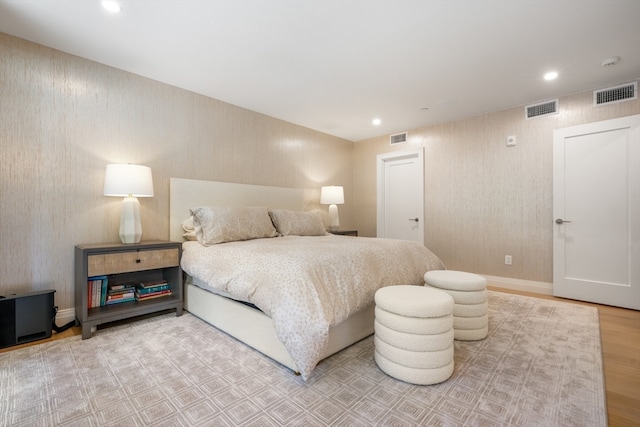 bedroom featuring light hardwood / wood-style floors