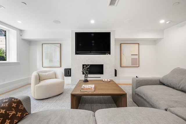 30 Concord Sq Unit 1, Boston, MA 02118 - living area featuring baseboards, visible vents, a large fireplace, and recessed lighting