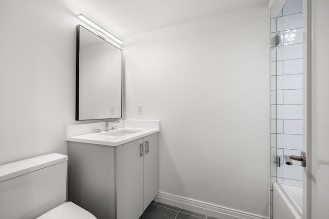 30 Concord Sq Unit 1, Boston, MA 02118 - full bathroom featuring vanity, toilet, tile patterned flooring, and baseboards