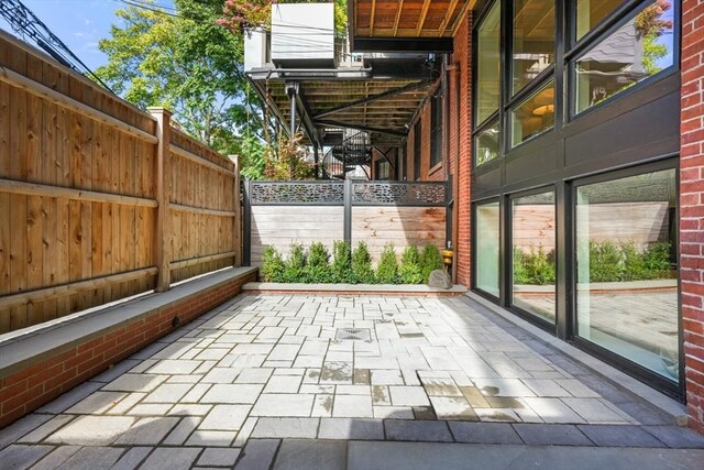 30 Concord Sq Unit 1, Boston, MA 02118 - view of patio / terrace with fence