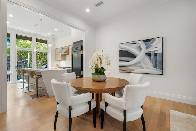 30 Concord Sq Unit 1, Boston, MA 02118 - dining room featuring recessed lighting, light wood-style flooring, ornamental molding, baseboards, and visible vents