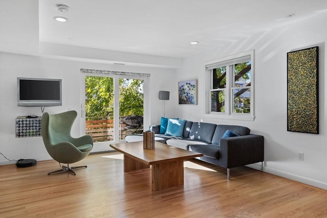 interior space with light wood-style floors, recessed lighting, and baseboards