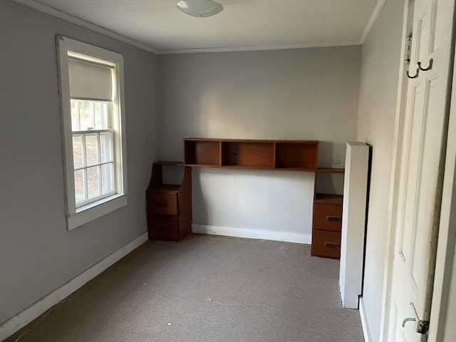 unfurnished bedroom featuring ornamental molding