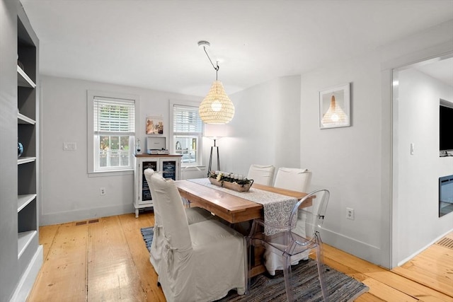 11 Congress St, Newburyport, MA 01950 - dining space featuring light wood-type flooring and baseboards