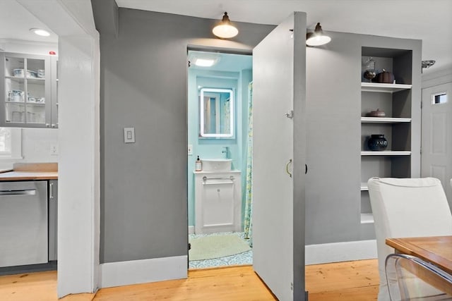 11 Congress St, Newburyport, MA 01950 - corridor with light wood-style floors and a sink