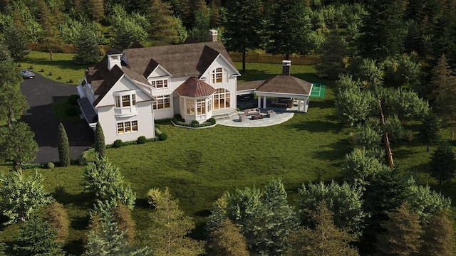 view from above of property featuring a forest