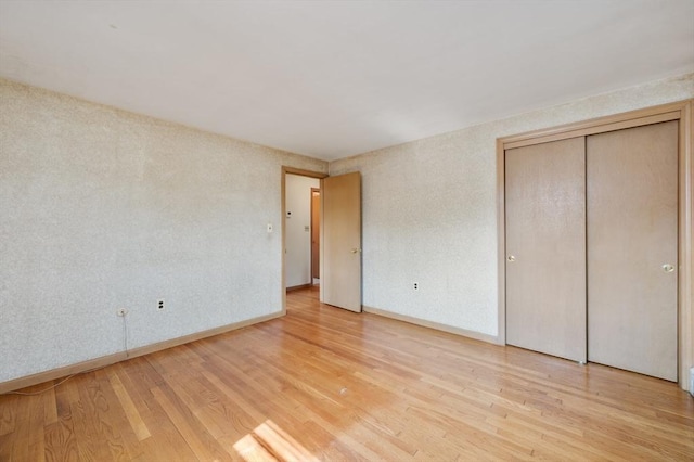 34 Buena Vista Ave, Salem, MA 01970 - unfurnished bedroom featuring light wood-type flooring and a closet